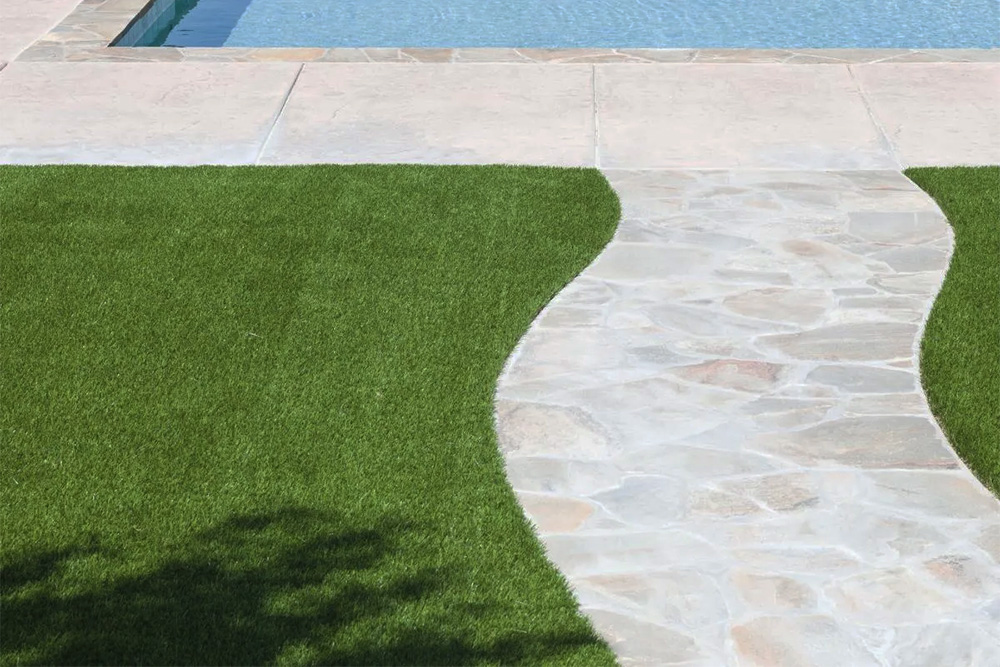 Our installation service covers every aspect of the job including excavation of the existing space, laying and compacting the stone and sand base layers, and expert laying of the artificial grass surface for a seamless, beautiful modern lawn.
